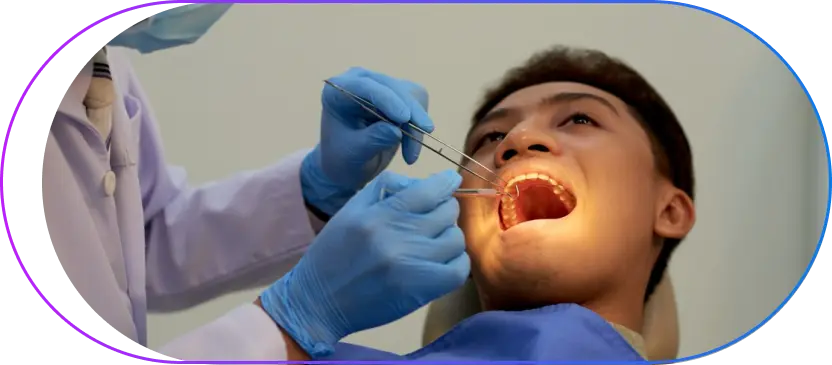 Patient receiving oral surgery treatment in a professional clinical setting